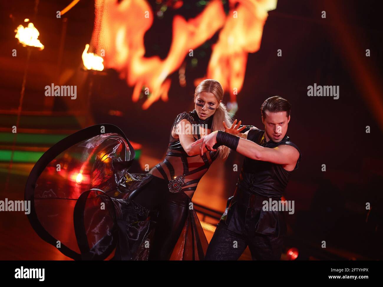 Cologne, Germany. 21st May, 2021. Actress Valentina Pahde and professional dancer Valentin Lusin dance a Paso Doble on the RTL dance show 'Let's Dance'. Credit: Rolf Vennenbernd/dpa-Pool/dpa/Alamy Live News Stock Photo