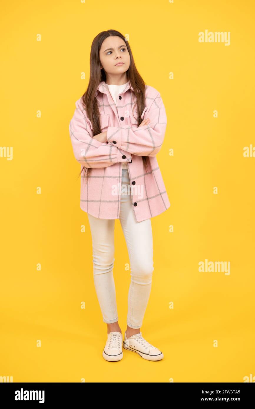 serious kid girl wear pink checkered shirt, fashion Stock Photo - Alamy