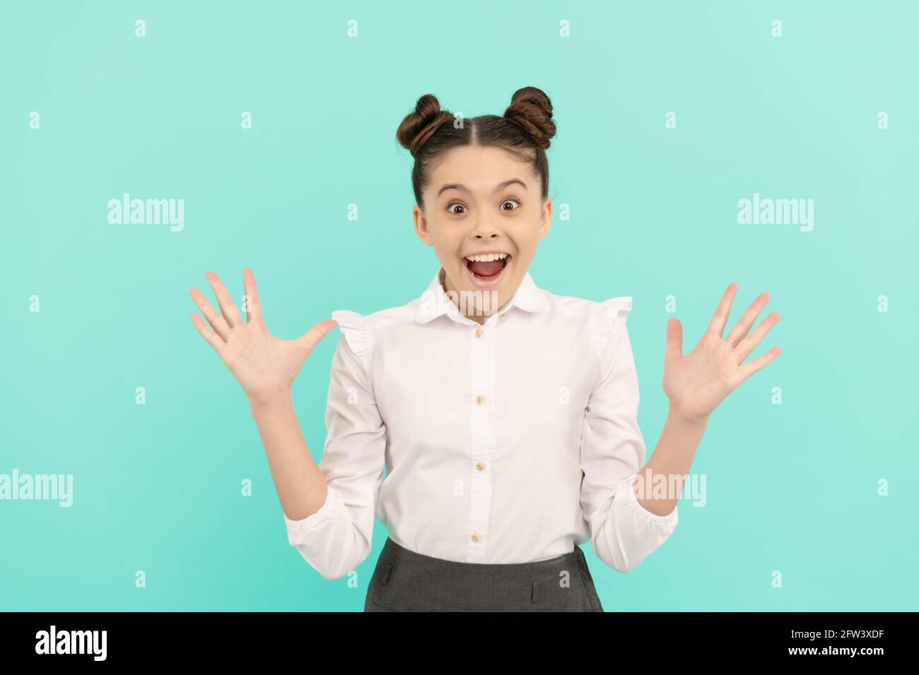 What a surprise. Surprised child blue background. School education. Back to school surprise Stock Photo