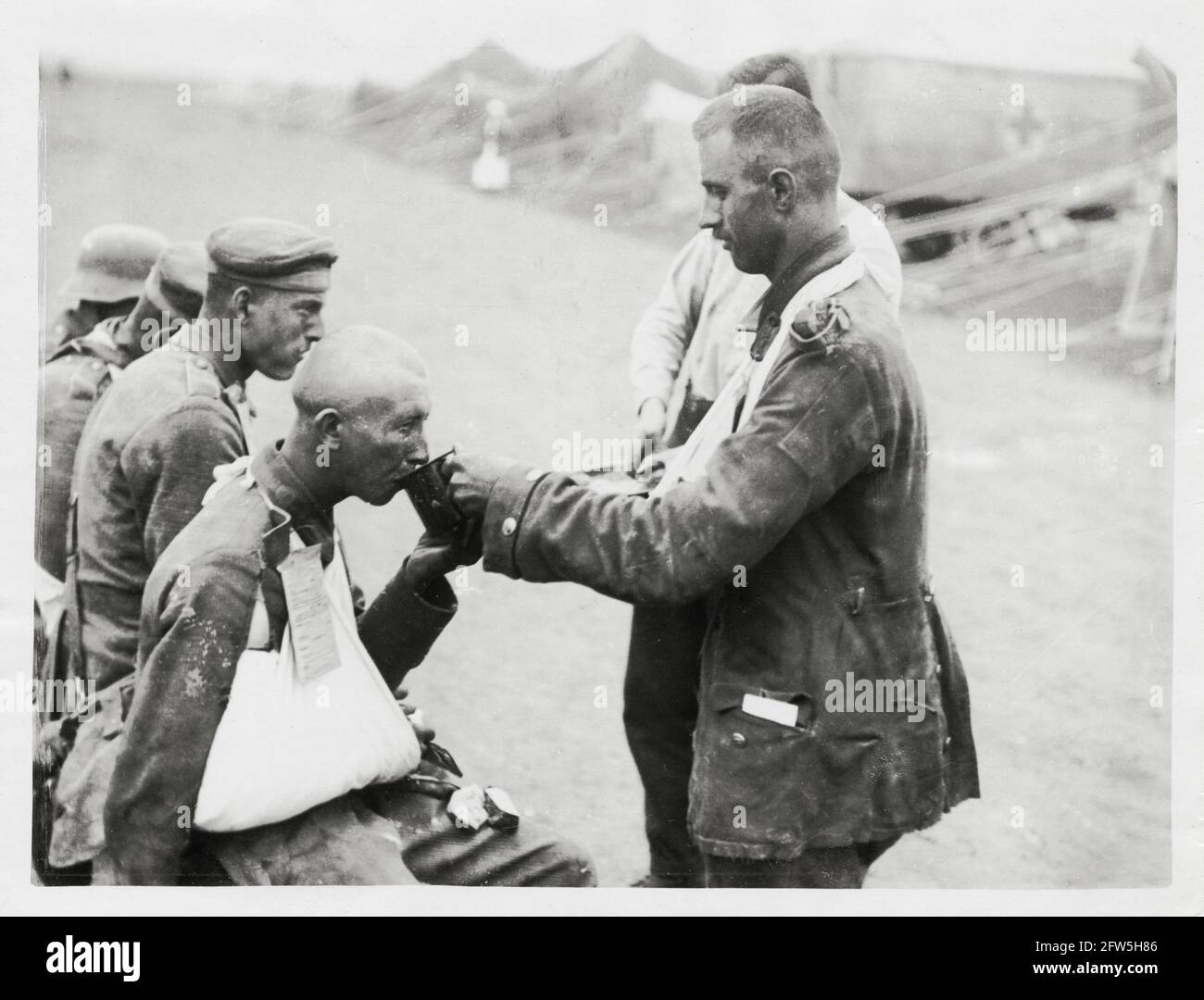 World War One, WWI, Western Front - A captured German prisoner being ...