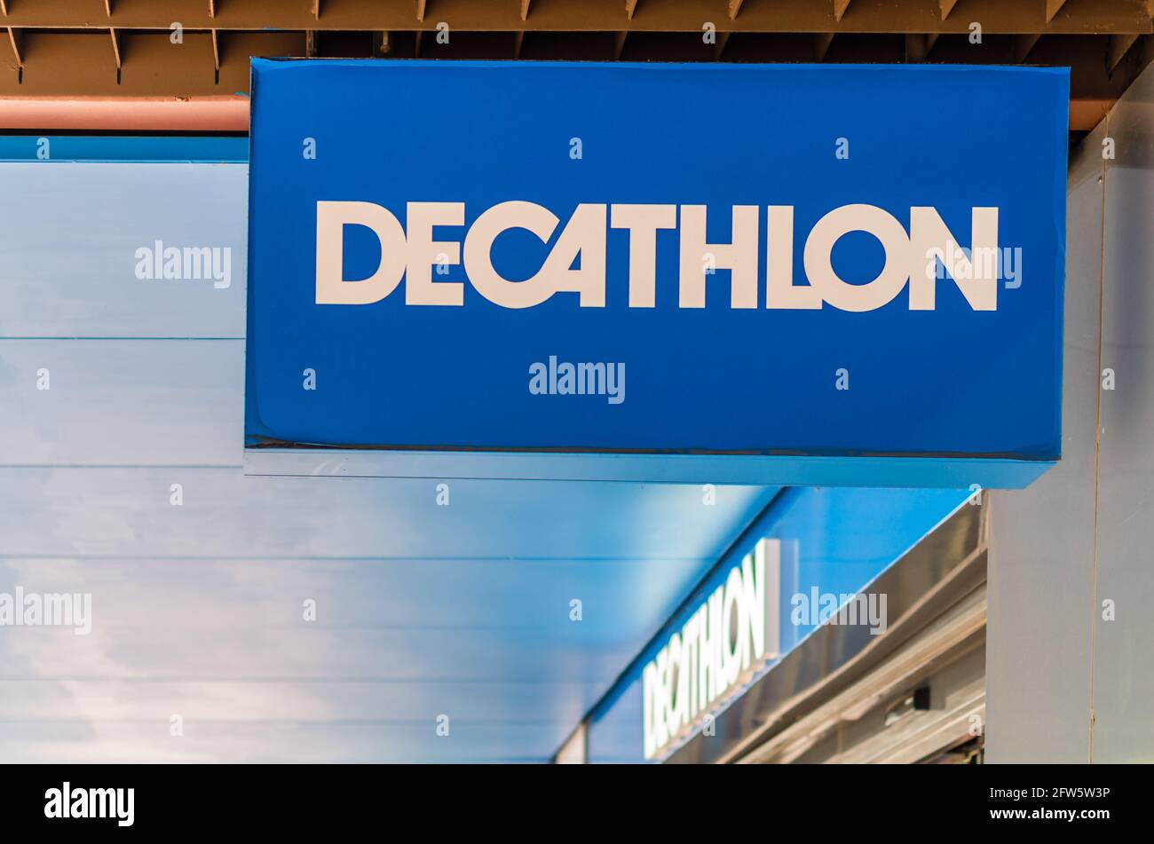 MADRID, SPAIN MAY 12, 2021 Decathlon logo on the facade of a store