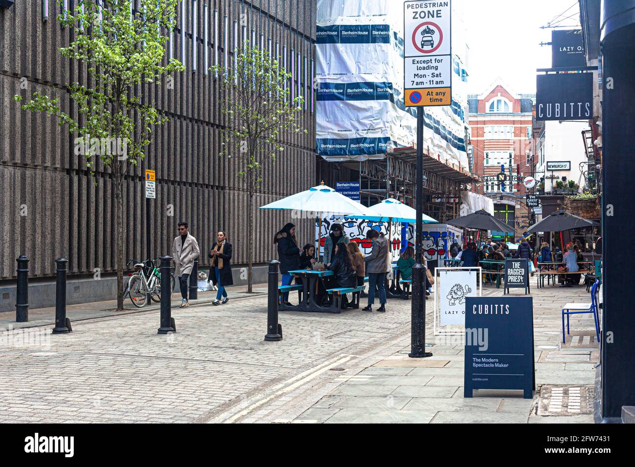 Pedestrian zone with traffic bollards, Ganton Street, Soho, London W1, England, UK. Stock Photo