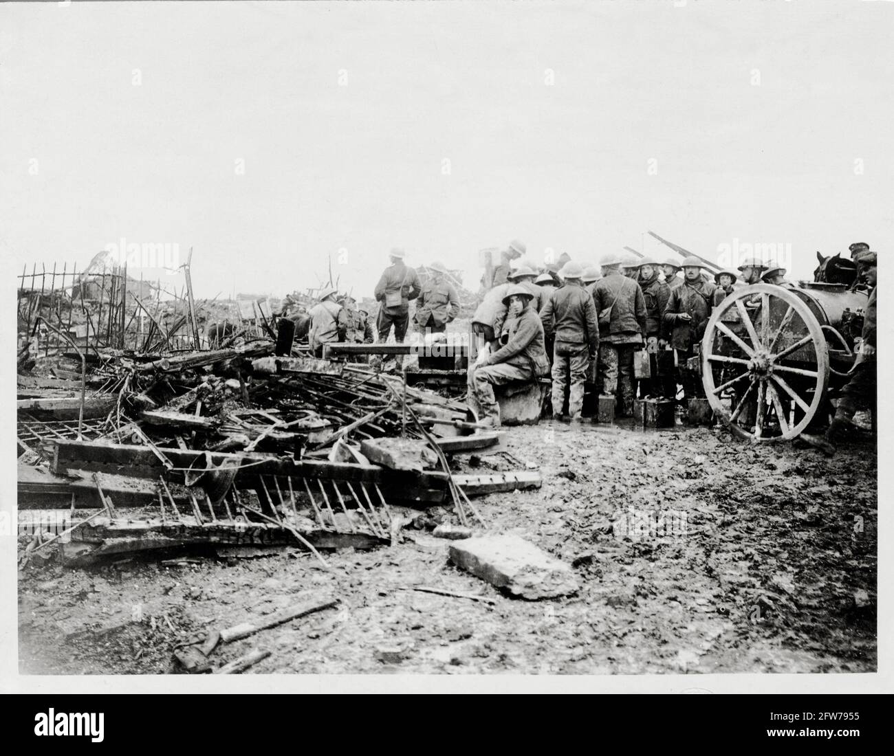 World War One, WWI, Western Front - Troops drawing water from a pump in a ruined village, France Stock Photo