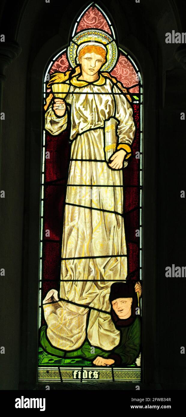 Fides, Faith, stained glass window by Burne-Jones, 1865, detail from 'Faith, Hope and Charity' window, Sculthorpe church, Norfolk, England UK Stock Photo