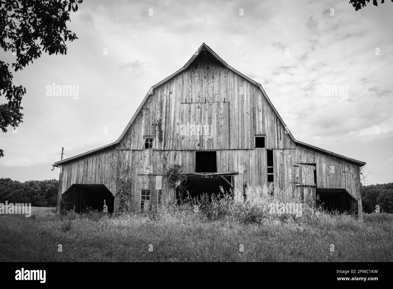 Black and white photo of a majestic old barn Stock Photo