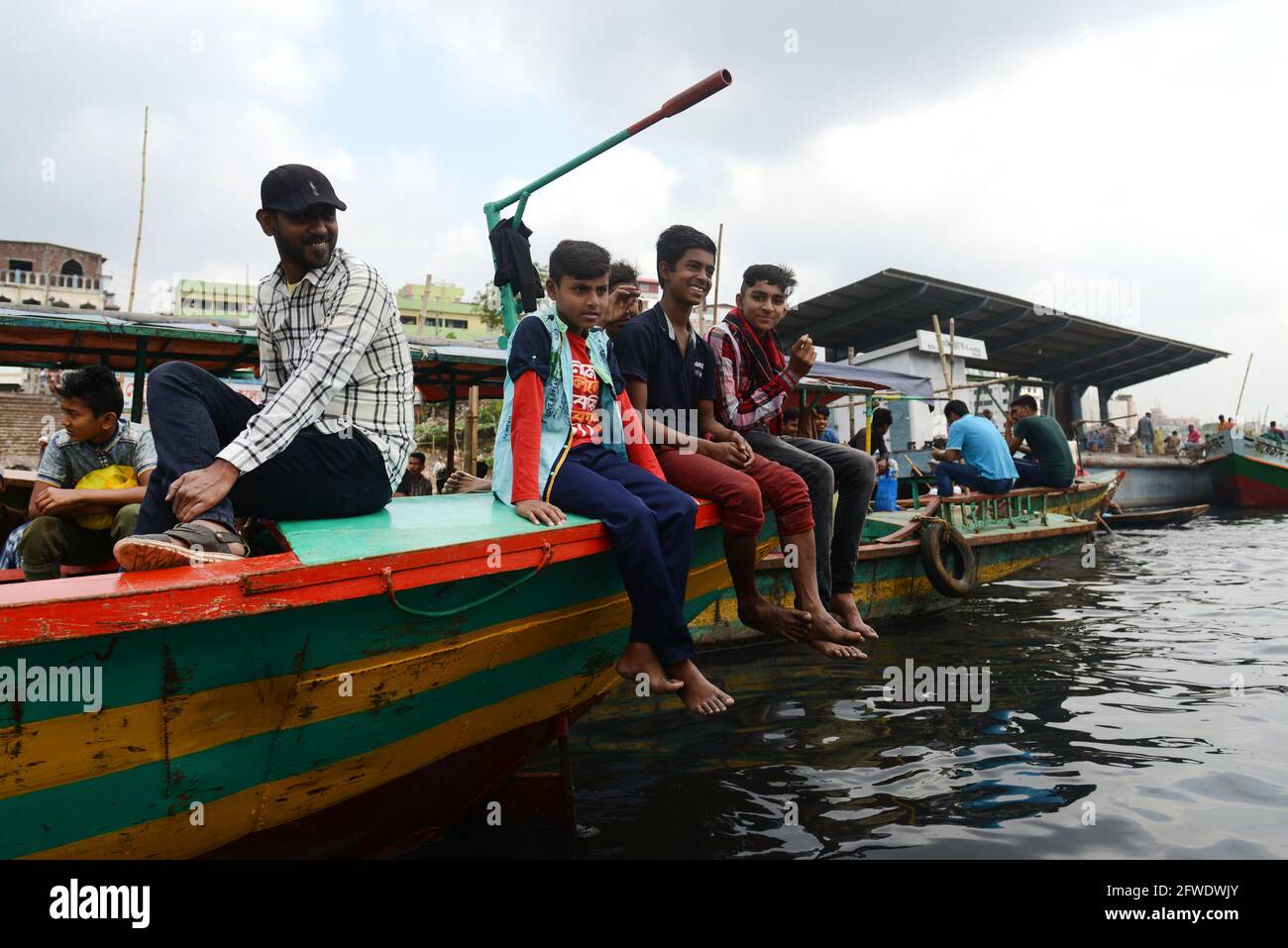 Boat taxis crossing the Buriganga river in Dhaka, Bangladesh. Stock Photo
