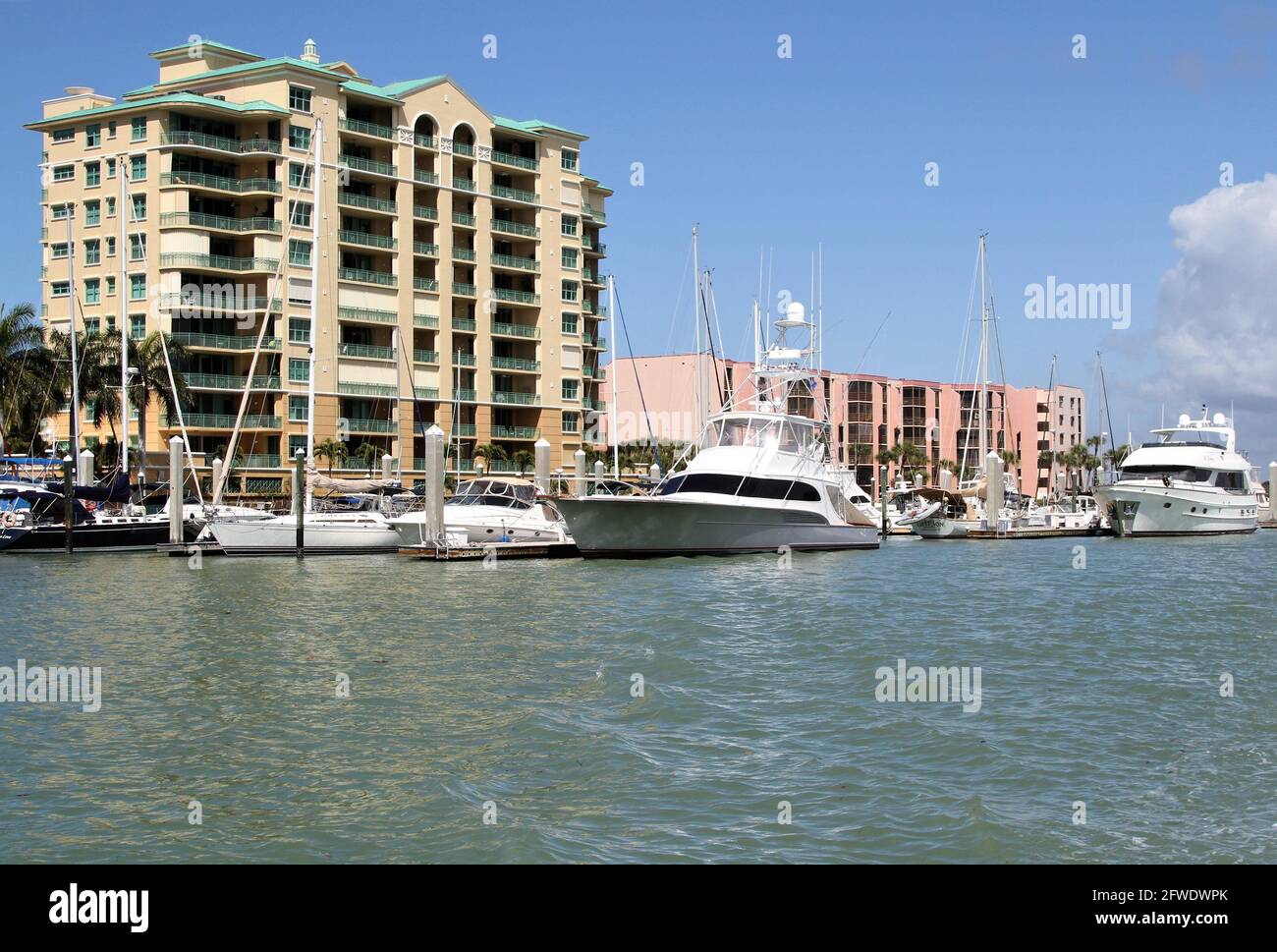 Yachts and sailboats in a marina in Marco Island, Florida Stock Photo