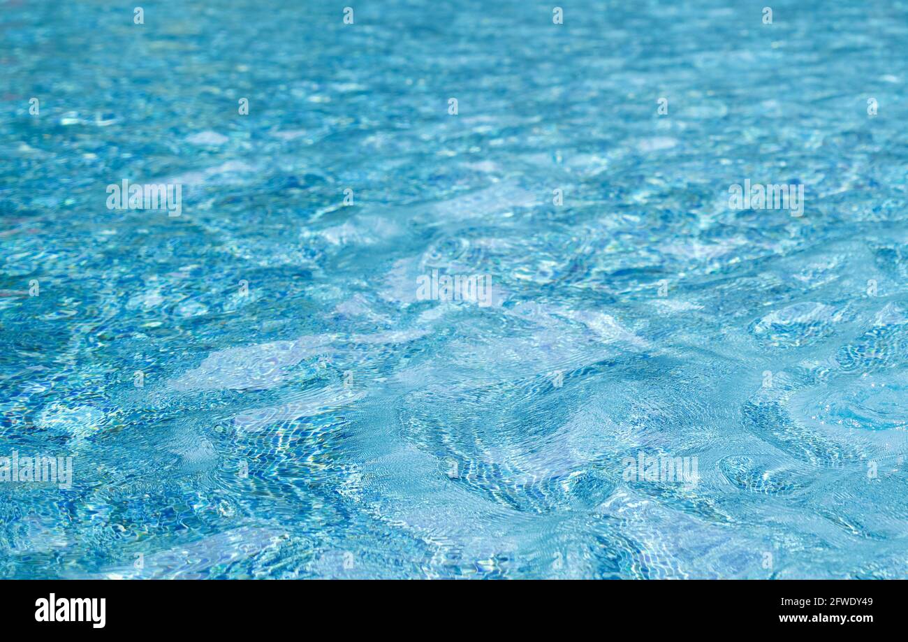 Water ripples on the surface of the turquoise swimming pool Stock Photo ...