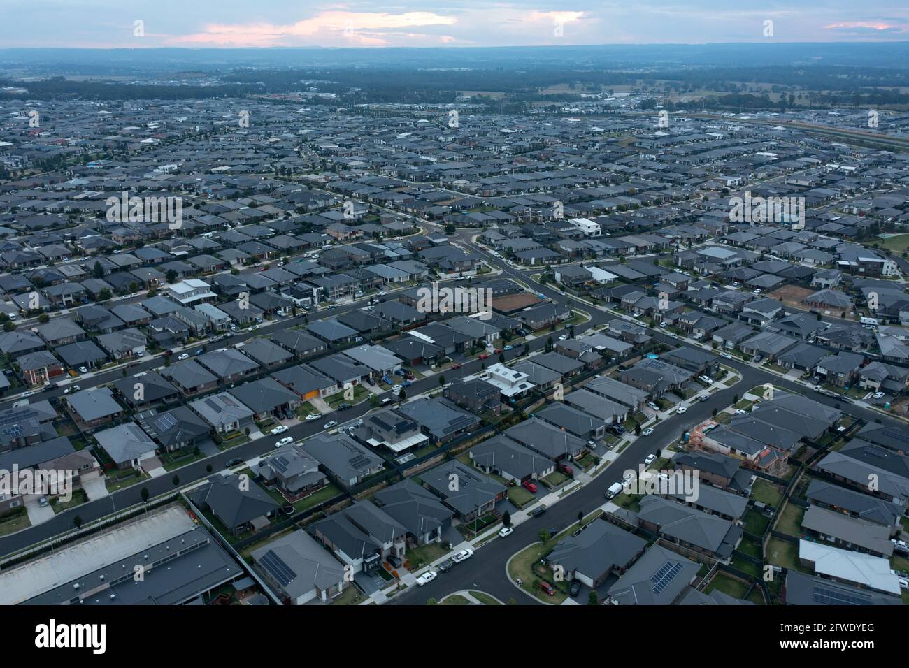 Aerial view of urban sprawl and the rapidly growing south western Sydney suburb of Oran Park. Stock Photo