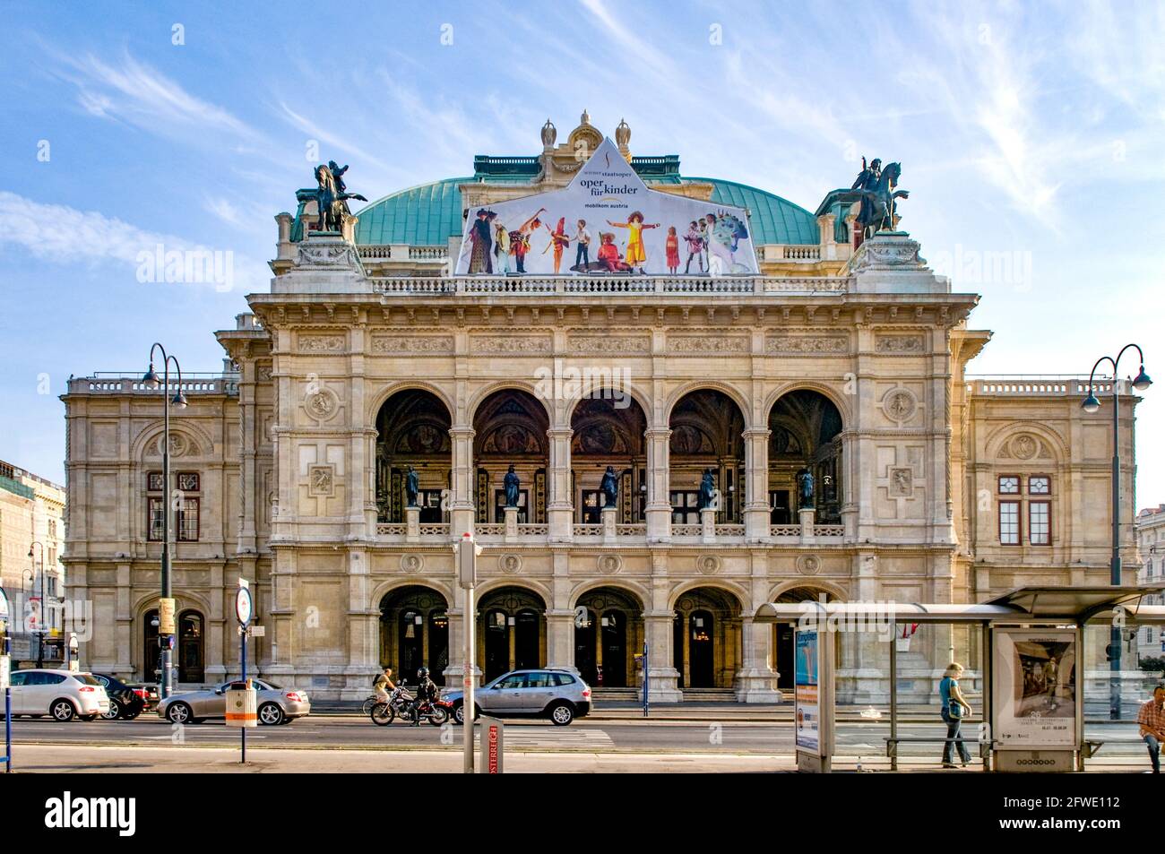 People watching open air live Opera outside the State Opera House in  Karajan Platz Vienna in Austria Stock Photo - Alamy