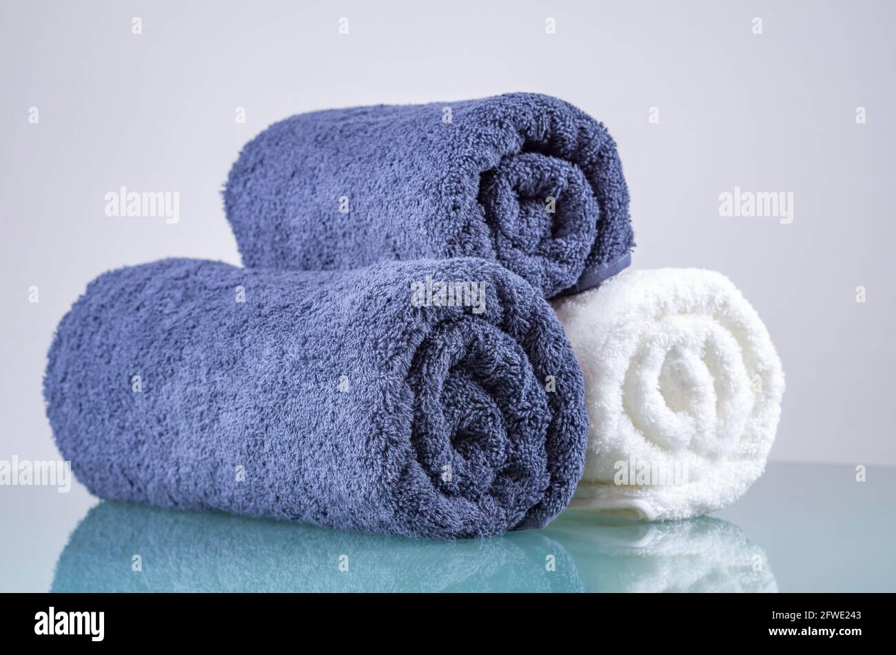 Towels, Close up of rolled white and blue fluffy towels, beauty