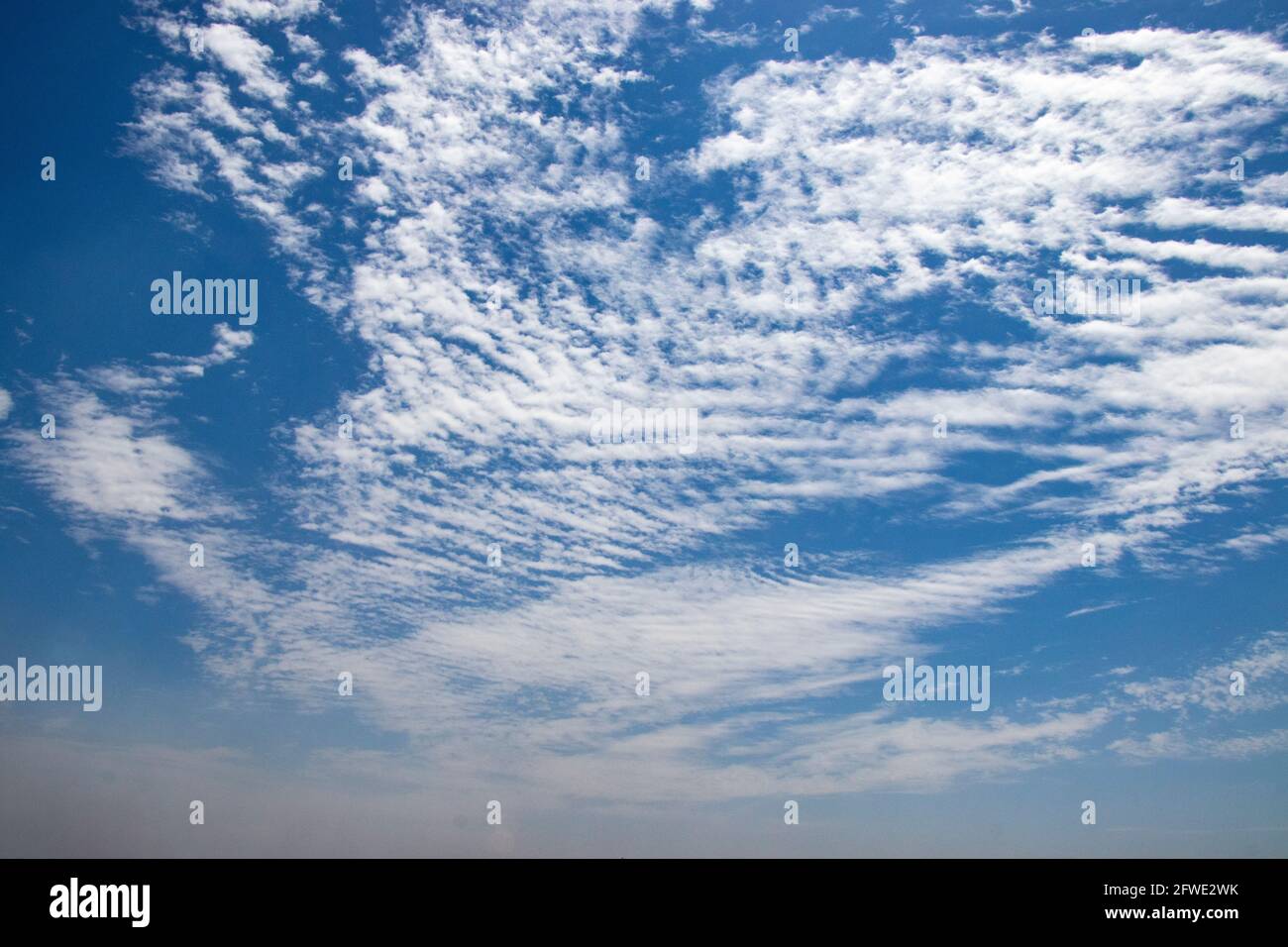 Dramatic Sky Background. Clouds in blue Sky. Moody Cloudscape. Panoramic Image Can Be Used as Web Banner Stock Photo