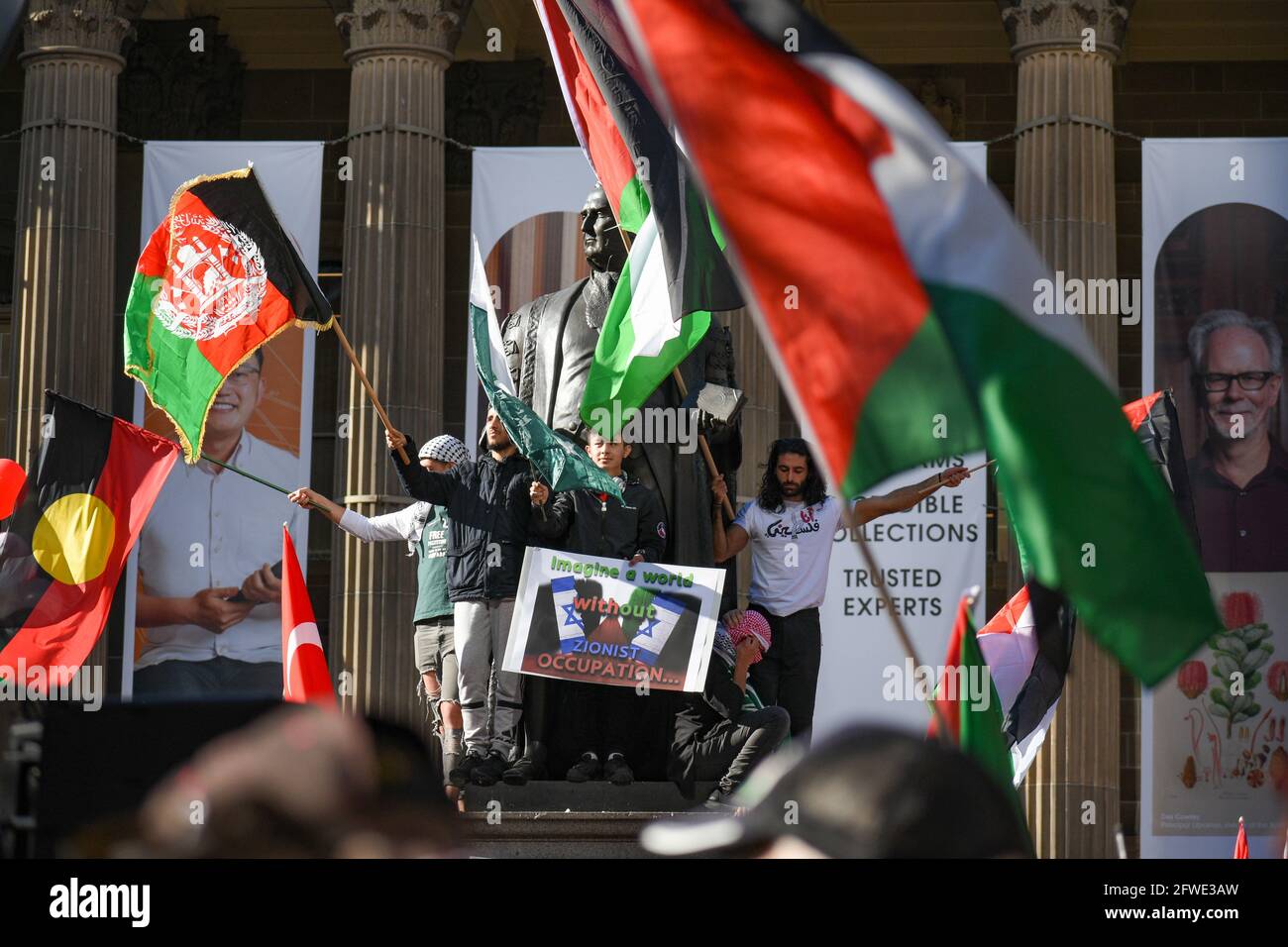 Melbourne, Australia. 22nd May 2021. For the second consecutive weekend, supporters of freedom for Palestine gather in Melbourne to protest the atrocities being committed against the indigenous Palestinian people in their homeland. This follows a ceasefire between Israeli and Palestinian forces announced the day before. Credit: Jay Kogler/Alamy Live News Stock Photo