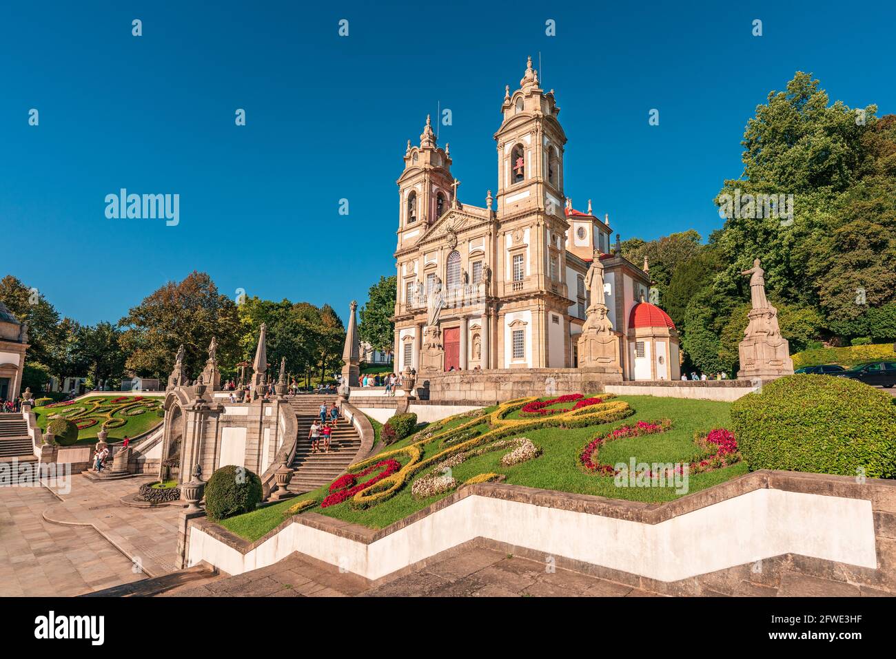 Tenões, Portugal. August 22, 2020. Exterior view of the neoclassical church 'Bom Jesus do Monte' in Braga. Sunny day with tourists. Stock Photo