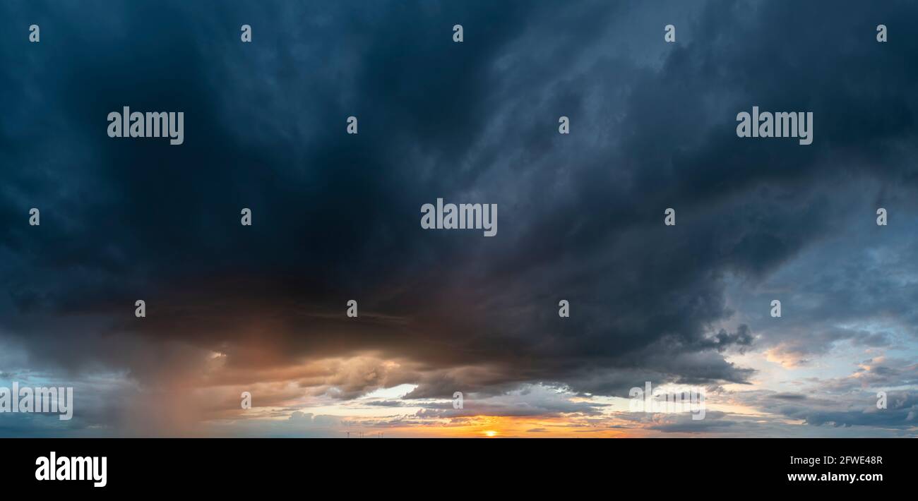 storm clouds at sunset Stock Photo