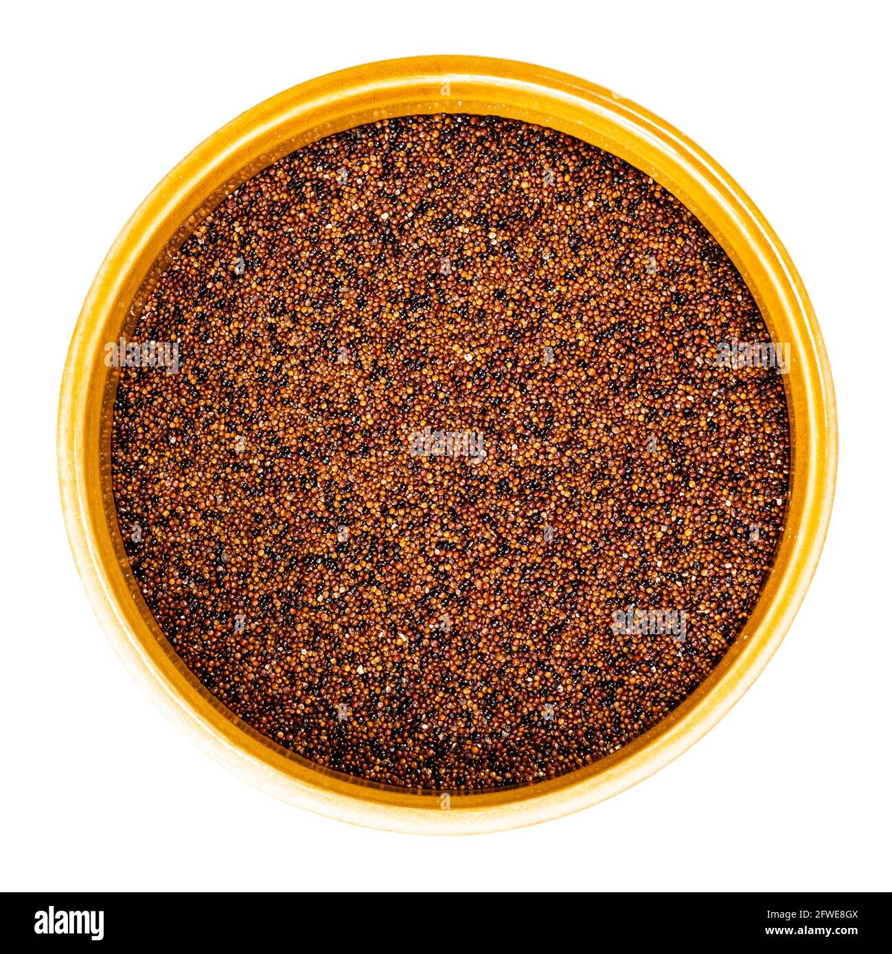top view of canihua seeds in round ceramic bowl cutout on white background Stock Photo
