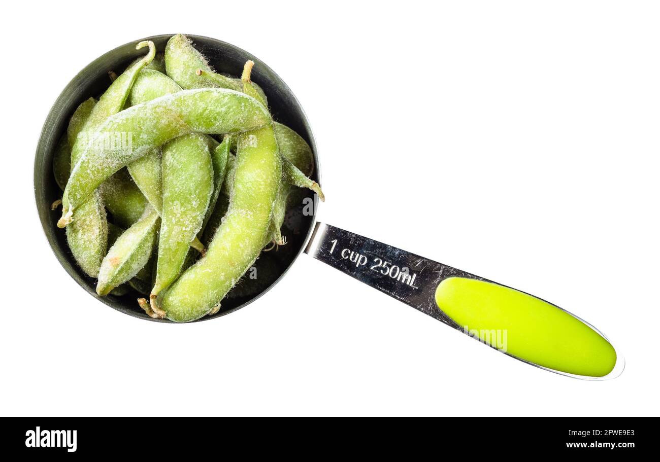top view of frozen Edamame unripe soybeans in pod in measuring cup