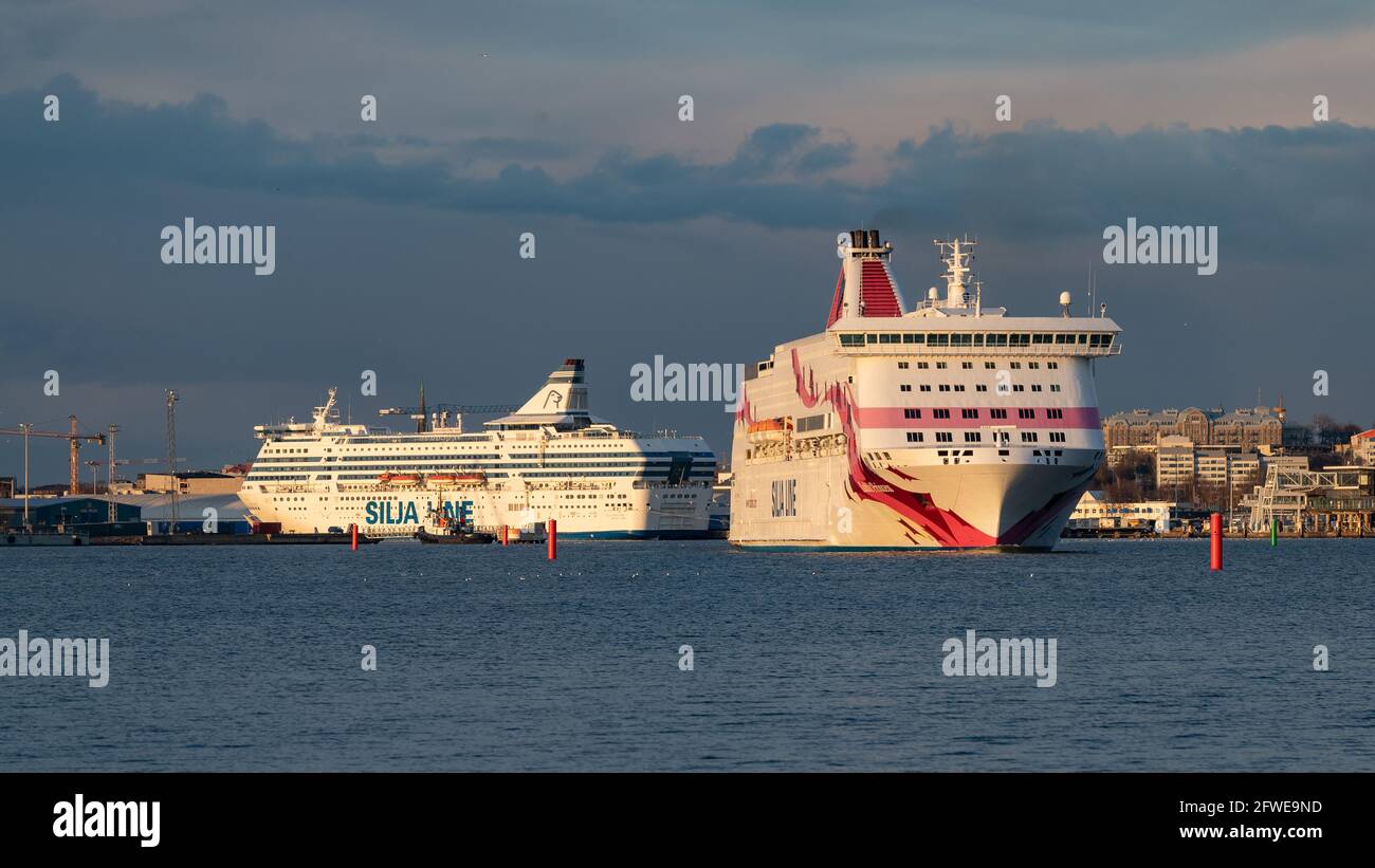 Baltic Princess leaving Turku for Stockholm. In the background Silja Serenade under layup due to COVID-19. Stock Photo