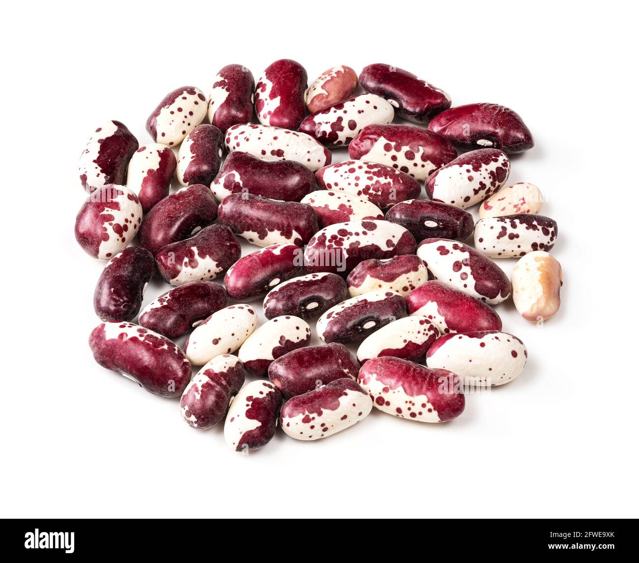 pile of red speckled kidney beans closeup on white background Stock