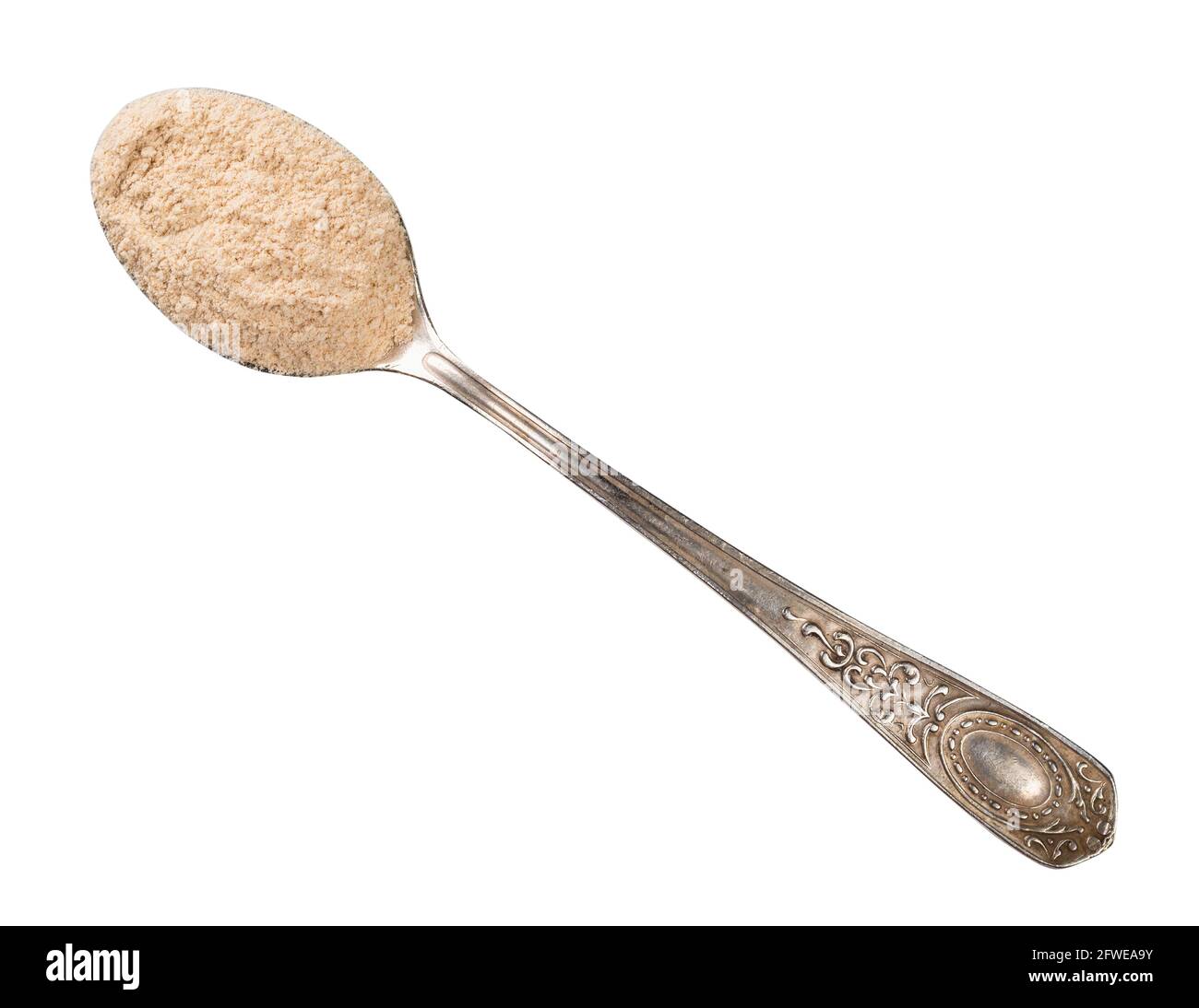 top view of apple pectin powder in silver spoon cutout on white ...