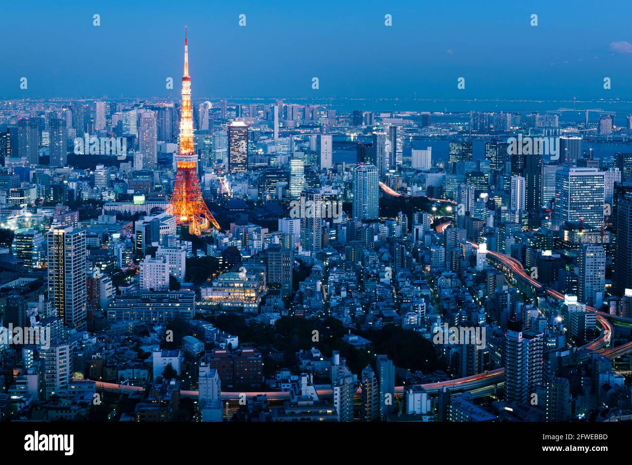 Tokyo, Japan - January 14, 2016: Sunset view of Tokyo Skylines with the Tokyo Tower. Tokyo is both the capital and largest city of Japan. Stock Photo