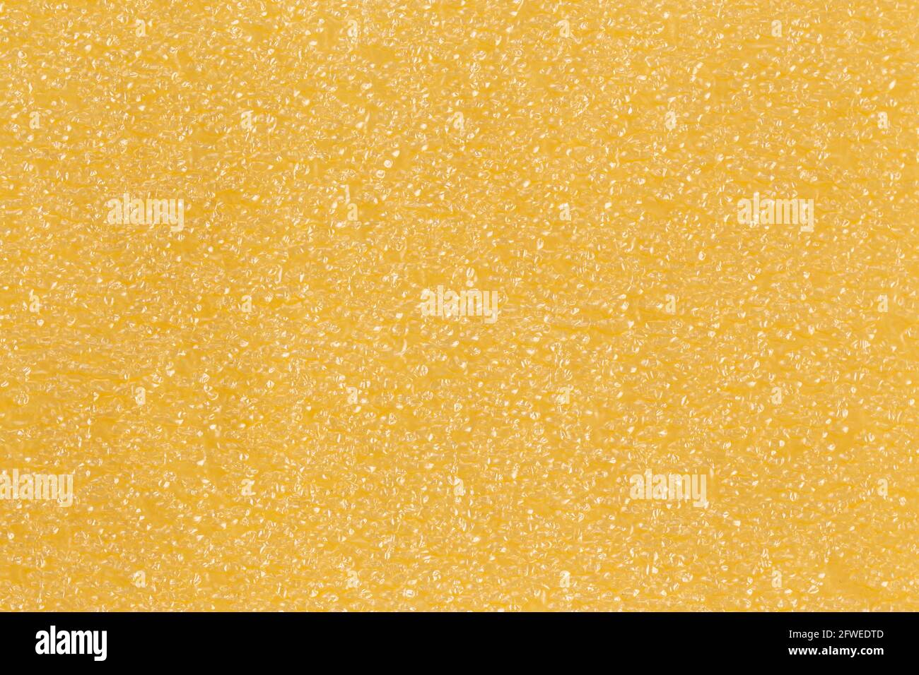 Yellow blistered surface. Seamless background. Stock Photo