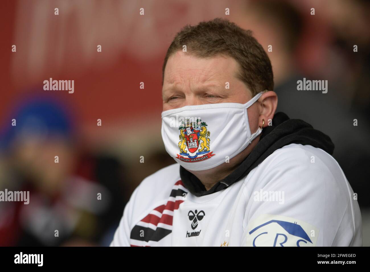 A Wigan Warriors fan follows their team away to the AJ Bell stadium for the first time since the