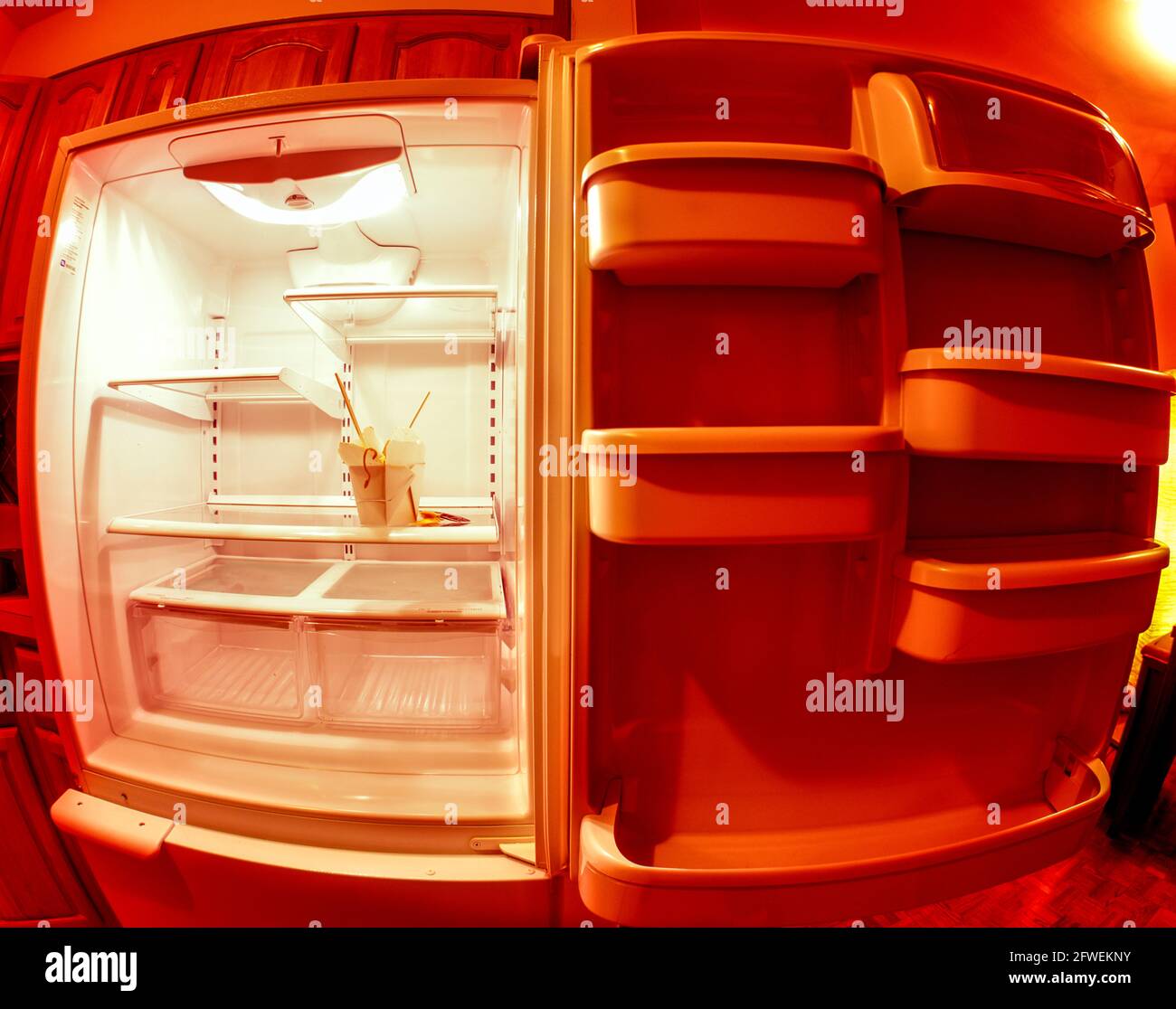 2006 HISTORICAL OPEN DOOR INTERIOR OF EMPTY REFRIGERATOR  (©ELECTROLUX 2005) Stock Photo