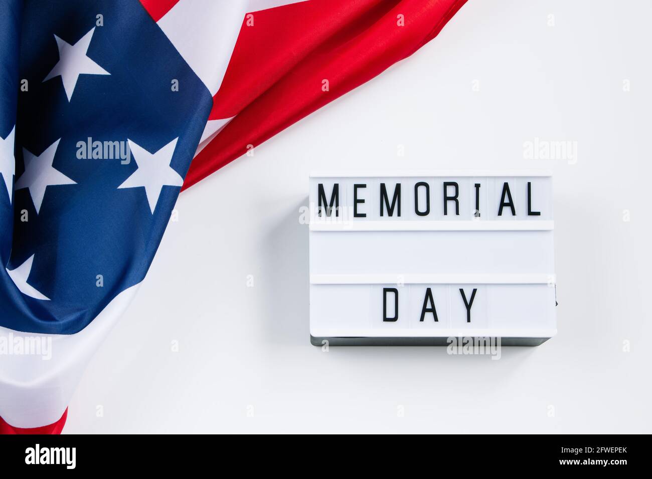 USA Memorial Day concept. American flag and text on a white background. Celebration of  national holiday. Stock Photo