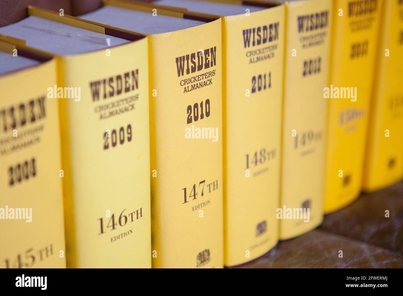 Display of Wisden Cricket Almanacks in a domestic home Stock Photo