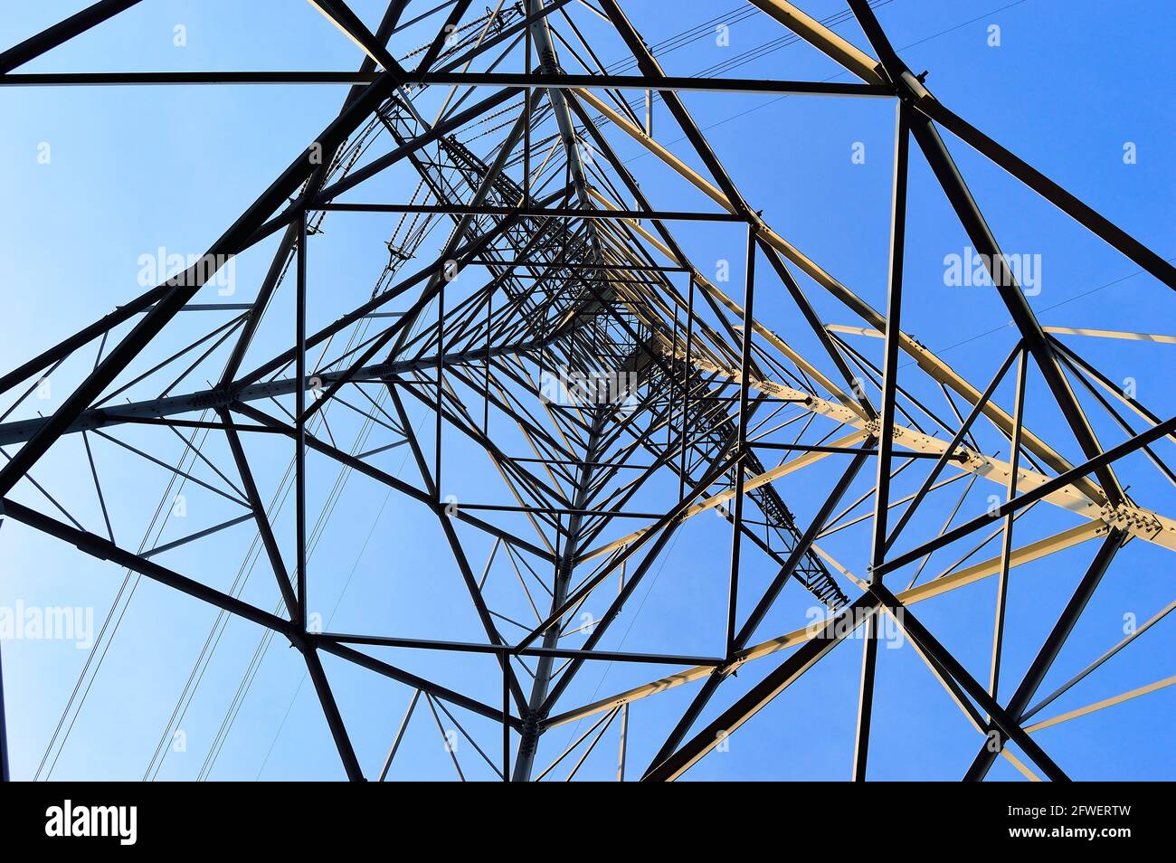 The structure of the power mast seen from the inside. Stock Photo