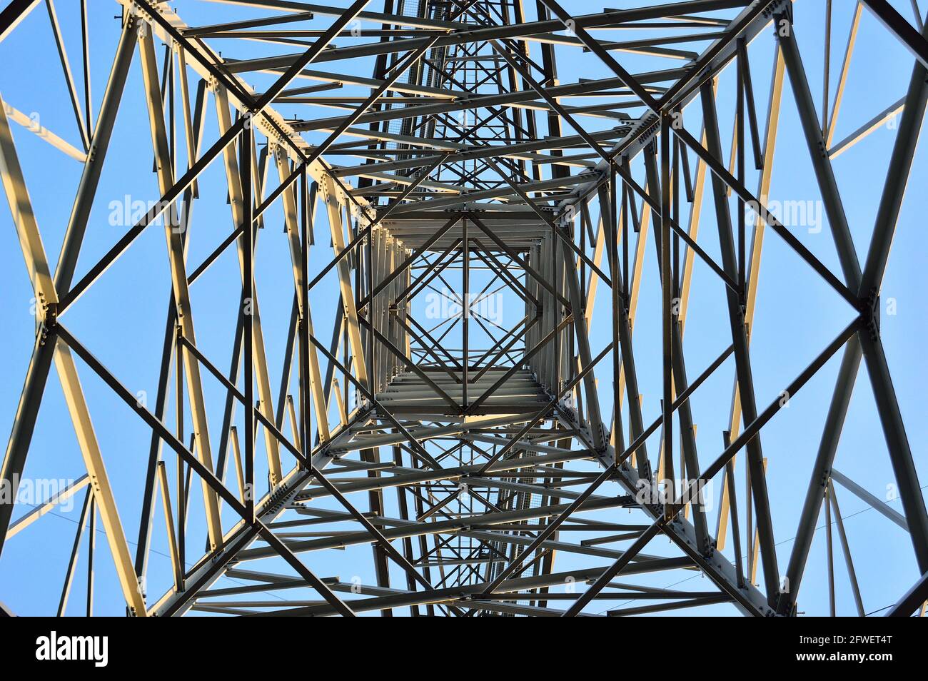 The structure of the power mast seen from the inside. Stock Photo