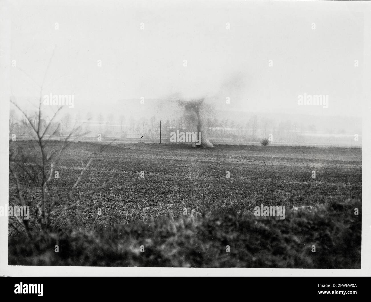 World War One, WWI, Western Front - A German shell landing in a field, France Stock Photo