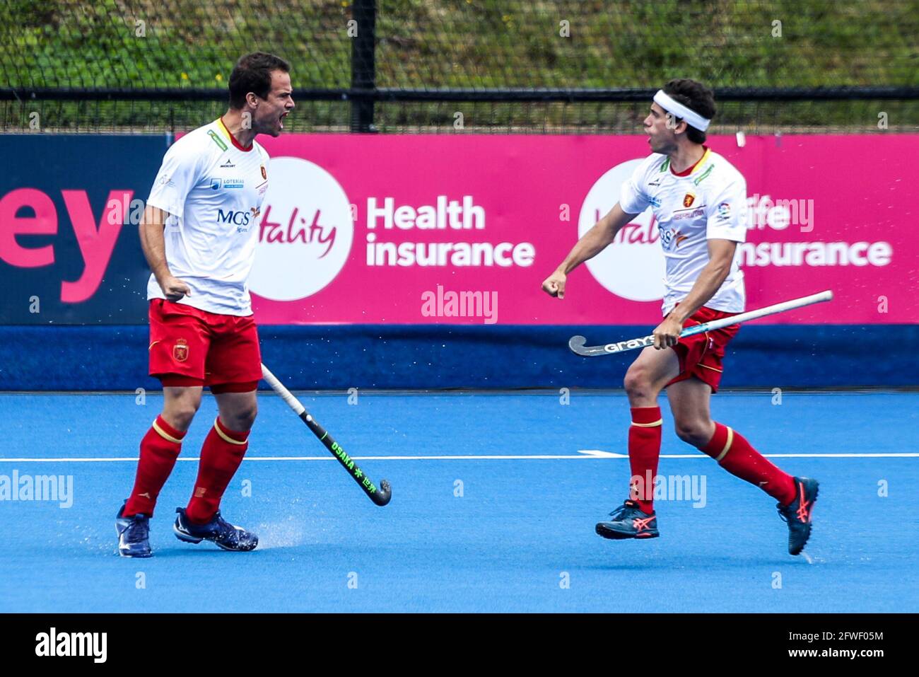 Spain???s Alvaro Iglesias (left) celebrates scoring his side's first goal of the game with Spain???s Enrique Gonzalez (right) during the FIH Pro league match at Lee Valley Hockey and Tennis Centre. Picture date: Saturday May 22, 2021. Stock Photo