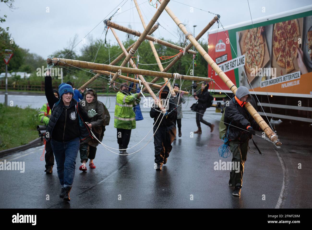 Hemel Hempstead, UK. 22.05.21 - Animal Rights activists blocked all 4 of McDonalds UK distribution centres. They view McDonalds as a symbol of industrial animal agriculture which contributes to the climate crisis as well as causing suffering to animals. Credit: Gareth Morris/Alamy Live News Stock Photo