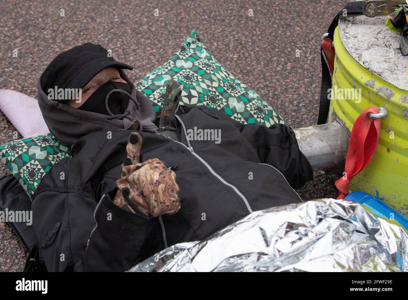 Hemel Hempstead, UK. 22.05.21 - Animal Rights activists blocked all 4 of McDonalds UK distribution centres. They view McDonalds as a symbol of industrial animal agriculture which contributes to the climate crisis as well as causing suffering to animals. Credit: Gareth Morris/Alamy Live News Stock Photo