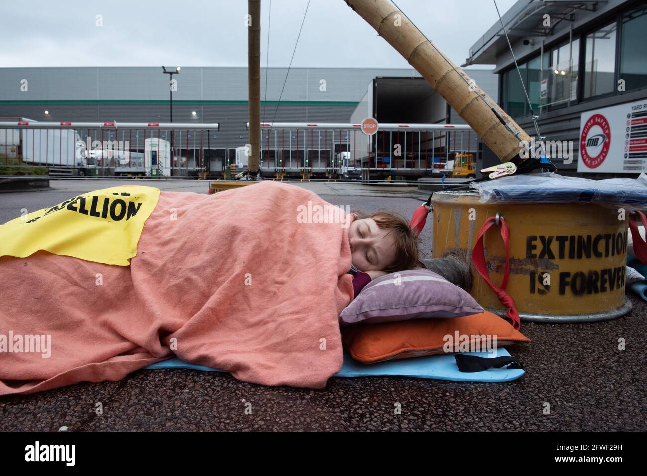 Hemel Hempstead, UK. 22.05.21 - Animal Rights activists blocked all 4 of McDonalds UK distribution centres. They view McDonalds as a symbol of industrial animal agriculture which contributes to the climate crisis as well as causing suffering to animals. Credit: Gareth Morris/Alamy Live News Stock Photo