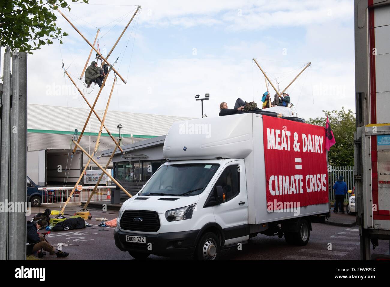 Hemel Hempstead, UK. 22.05.21 - Animal Rights activists blocked all 4 of McDonalds UK distribution centres. They view McDonalds as a symbol of industrial animal agriculture which contributes to the climate crisis as well as causing suffering to animals. Credit: Gareth Morris/Alamy Live News Stock Photo
