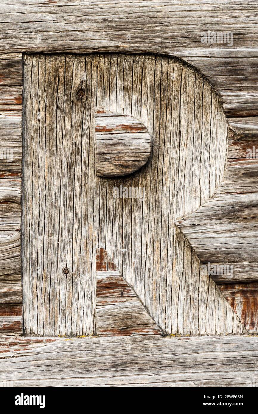 Letter R sawn from weathered wood Stock Photo - Alamy