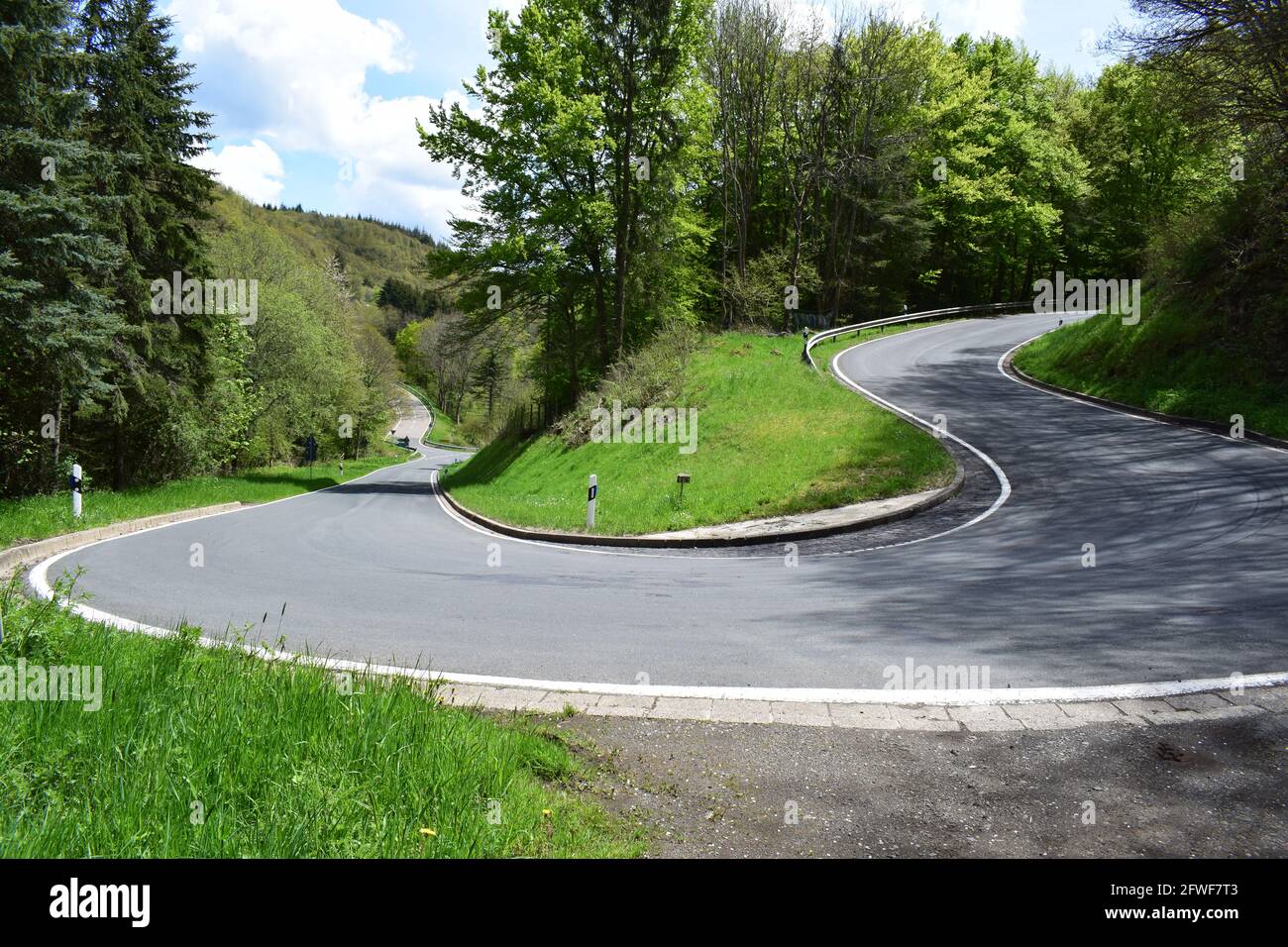 twisted Eifel road in spring Stock Photo