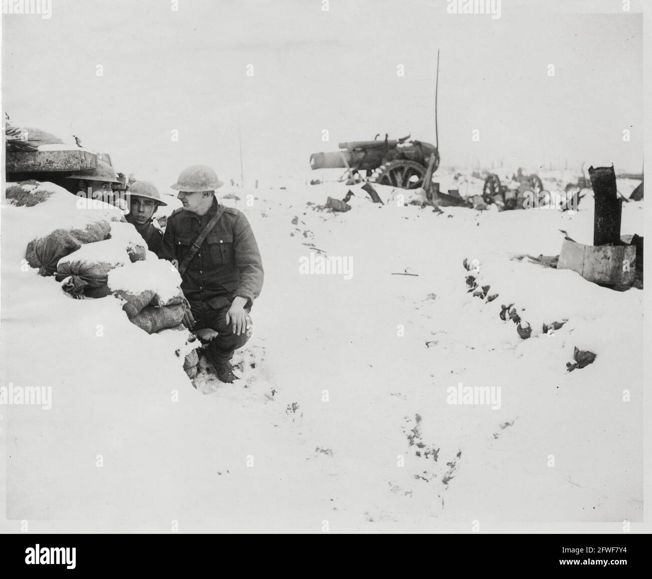 World War One, WWI, Western Front - Men talking in a dugout in the snow, France Stock Photo