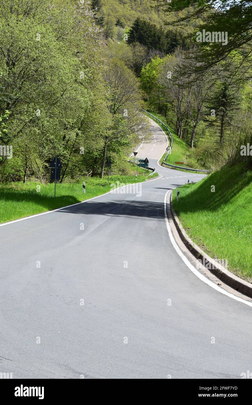 twisted Eifel road in spring Stock Photo