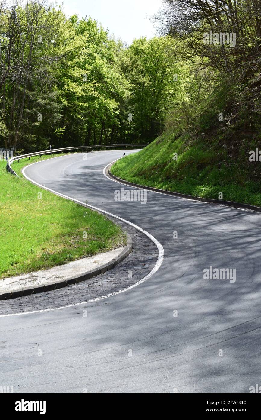 twisted Eifel road in spring Stock Photo