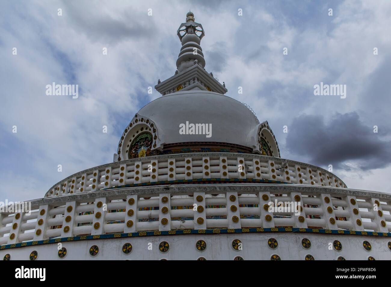 The Shanti Stupa with a cloudy backgound Stock Photo