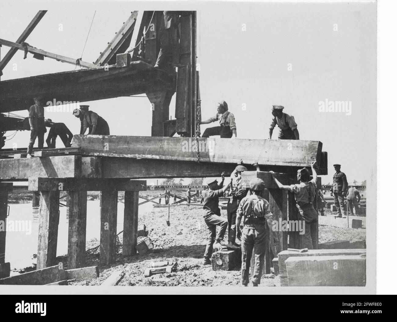 World War One, WWI, Western Front - Royal Engineers (RE) completing a railway bridge over a waterway in France Stock Photo