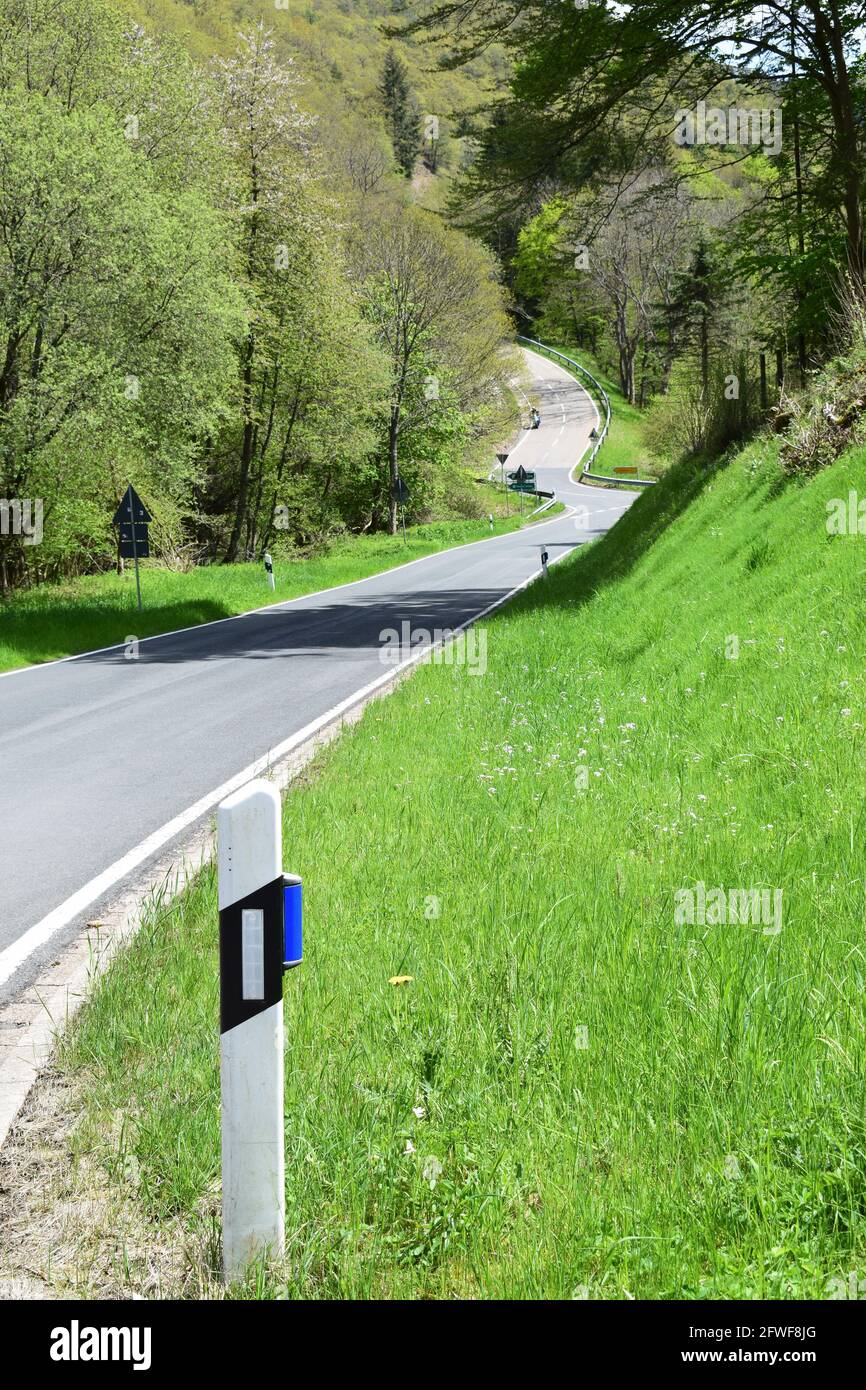 twisted Eifel road in spring Stock Photo