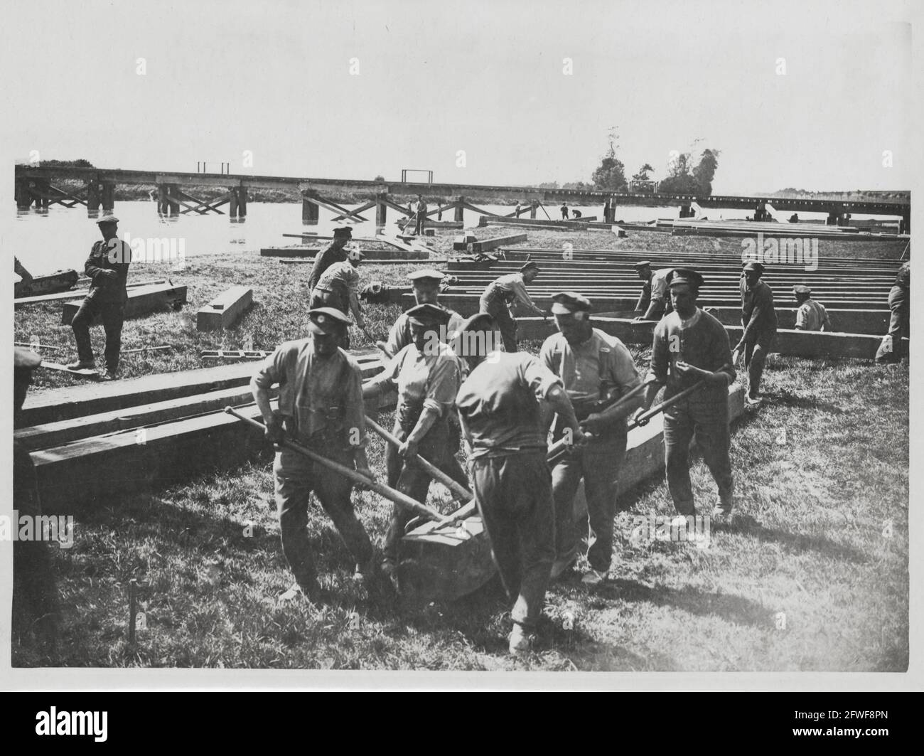 World War One, WWI, Western Front - Royal Engineers (RE) completing a railway bridge over a waterway in France Stock Photo