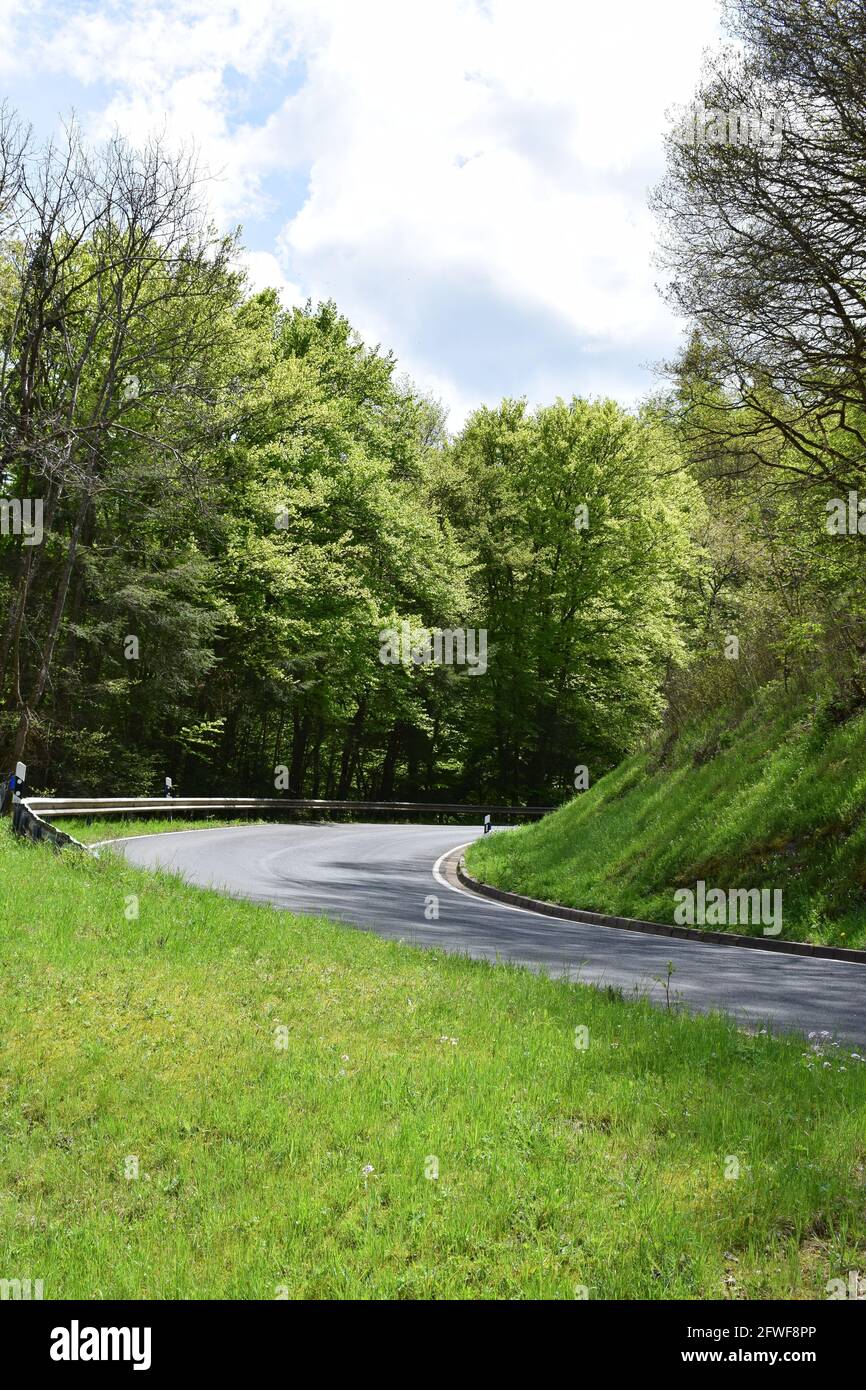 twisted Eifel road in spring Stock Photo