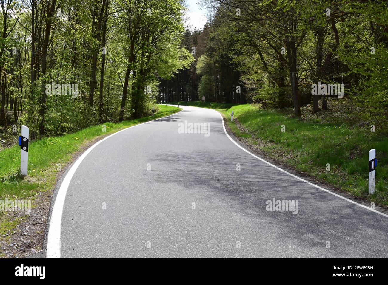 twisted Eifel road in spring Stock Photo