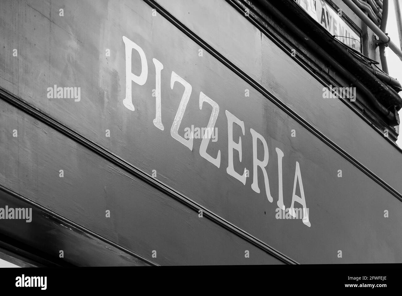 Pizzeria restaurant sign in black and white Stock Photo